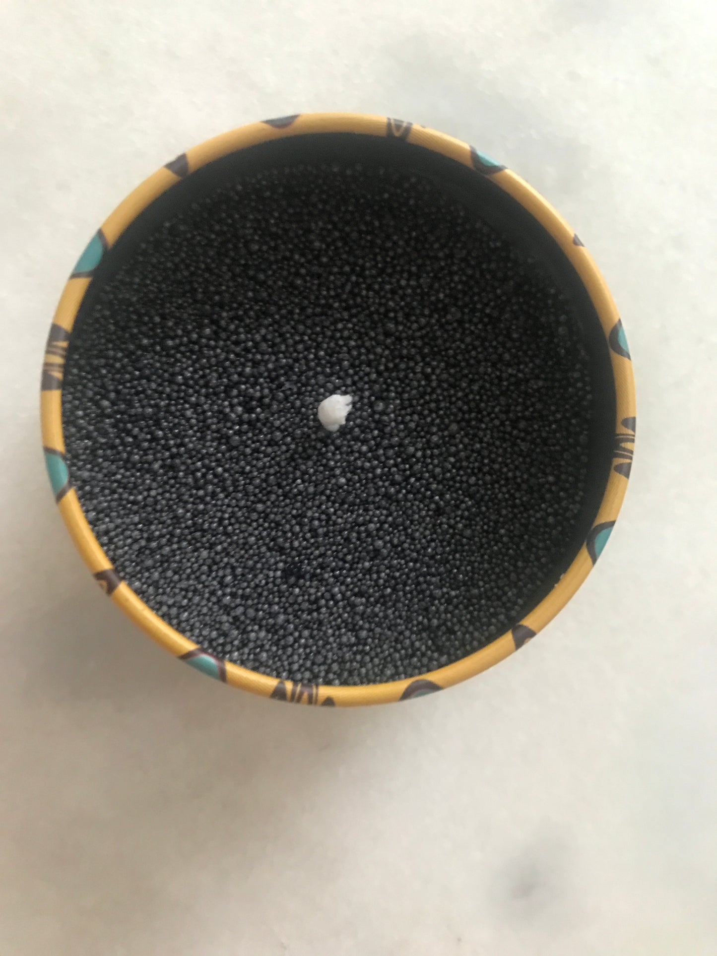 Black Sand Candle Yellow box